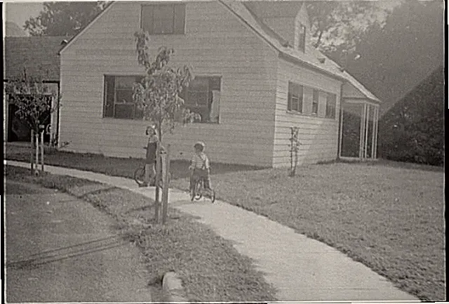 Photo:Greenhills Ohio 1938 FSA Children Bicycles House Suburban Yard