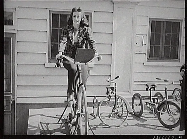 Photo:Washington DC 1940s Woman on Bicycle with Children Tricycles FSA